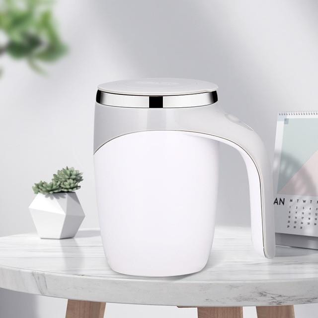 White self stirring mug